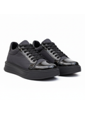 Titan Eclipse all-black glossy chunky sneaker by Apollo Moda, third angle