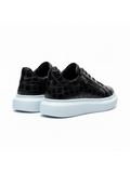 Men's Aether Noir by Apollo Moda, black croc-embossed sneaker with side zipper and white sole, third angle