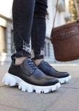 Cancun casual sneaker in black and white by Apollo Moda, view 2