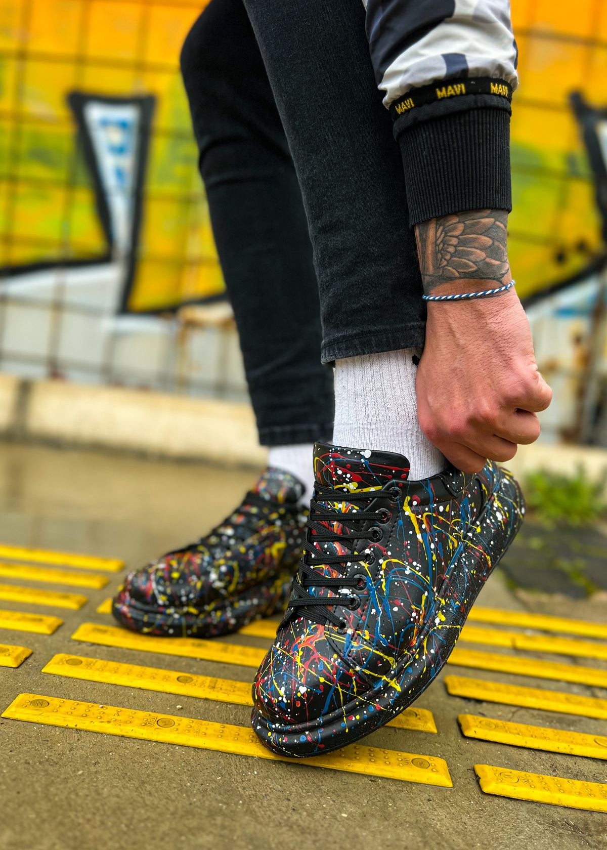 Stardust Edge hand-painted custom sneaker by Apollo Moda, worn on a striped surface