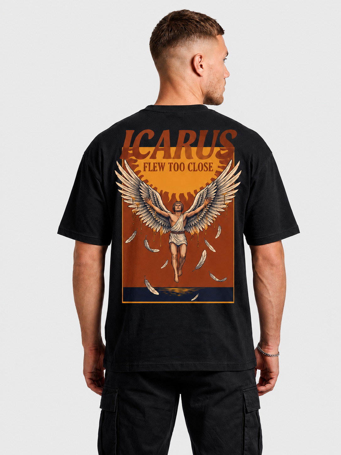 Ikarus flog zu nah Oversized Grafik-T-Shirt