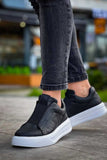 Izmir X-4 slip-on sneaker in black by Apollo Moda, view 7